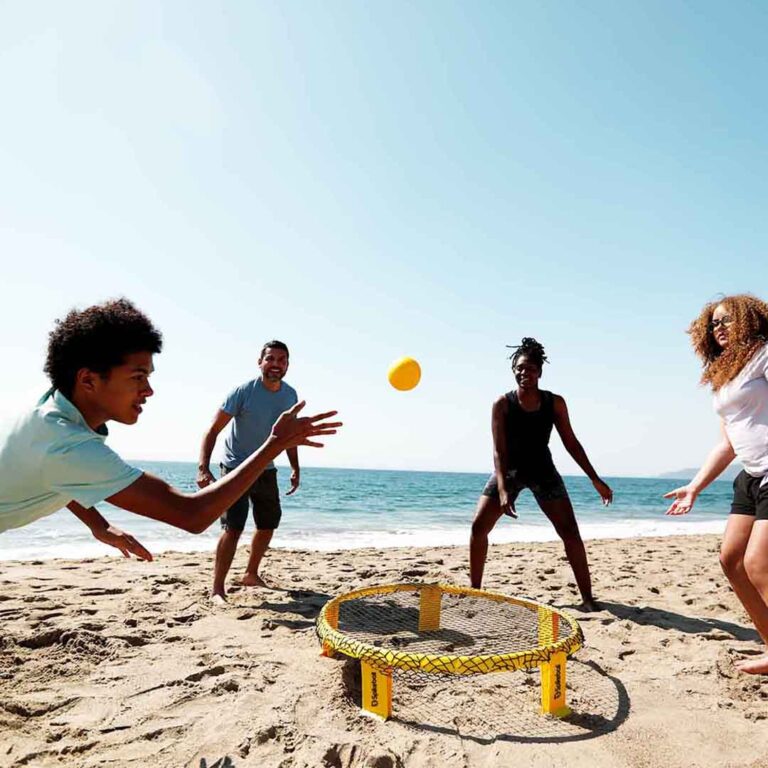 The objective of Spikeball is to hit the ball onto the circular net in such a way that the opposing team cannot return it. The first team to reach the designated number of points wins the game.